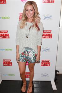 Ashley Tisdale attends the Colgate Optic White Beauty Bar at 901 Salon Day 1 at 901 Salon on June 1, 2012