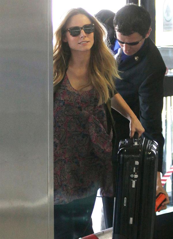 Kristen Bell - Departing on a flight at LAX - August 21, 2012