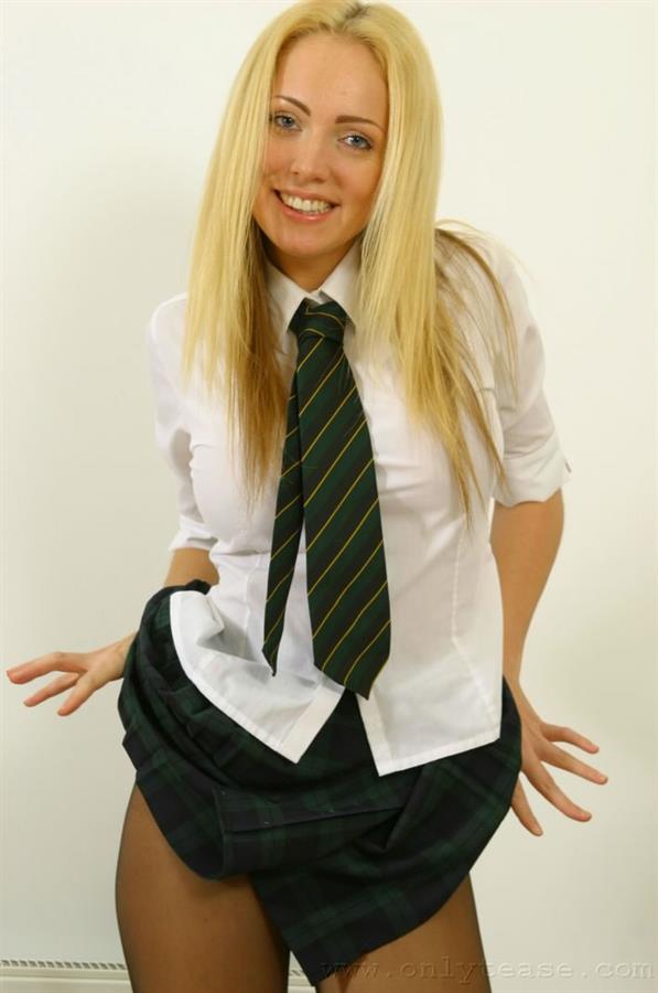Aisleyne Wallace in a white shirt and tie