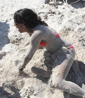 Alexandra Burke bikini candids Miami March 7, 2011 