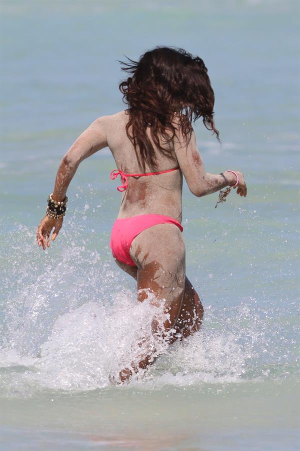 Alexandra Burke bikini candids Miami March 7, 2011 