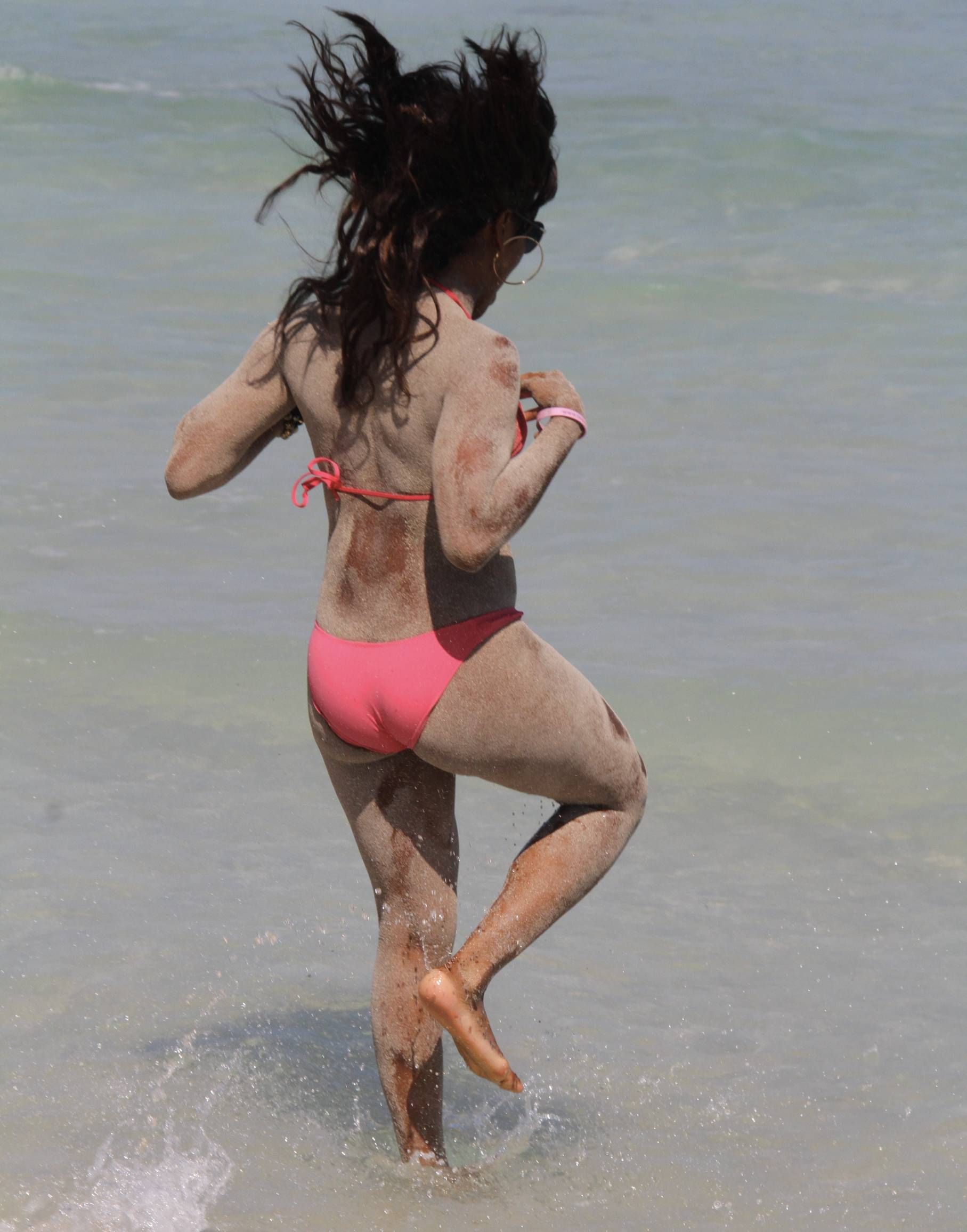 Alexandra Burke bikini candids Miami March 7, 2011 