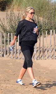 Alex Curran - Personal training session on a beach on September 19, 2011