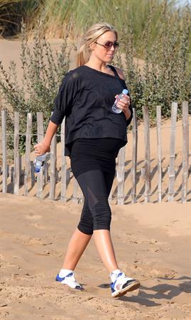 Alex Curran - Personal training session on a beach on September 19, 2011