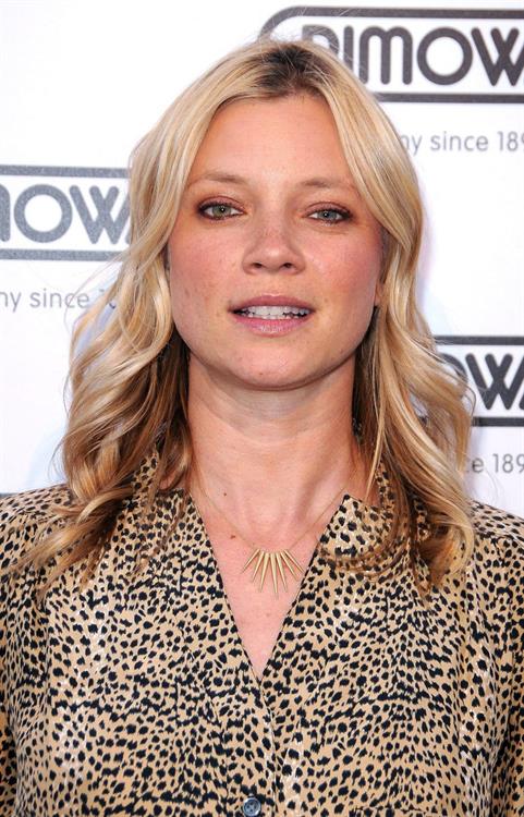 Amy Smart Rimowa New Rodeo Drive store opening party in Beverly Hills on May 16, 2011