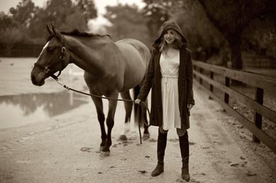 Arielle Kebbel pays tribute to her 1200 pound baby Pacific Breeze during a portrait session Los Angeles 