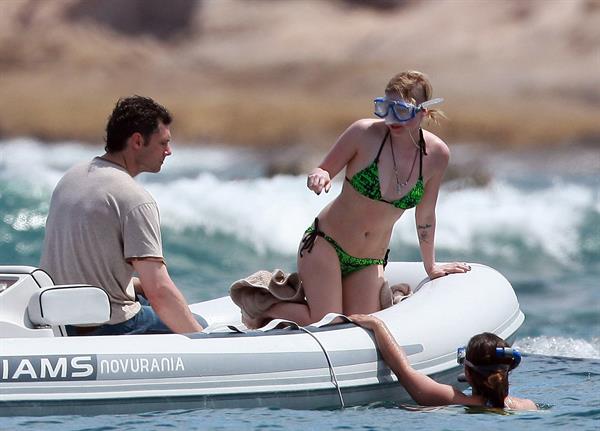 Avril Lavigne in a green bikini in Cabo, Mexico on July 27, 2012