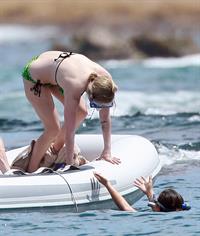 Avril Lavigne in a green bikini in Cabo, Mexico on July 27, 2012