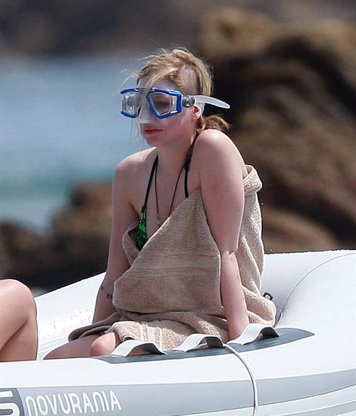 Avril Lavigne in a green bikini in Cabo, Mexico on July 27, 2012