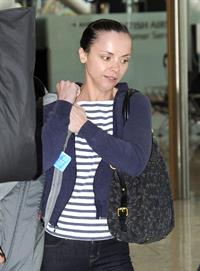 Christina Ricci With her boyfriend fly out of Heathrow Airport in London to NY - June 12, 2012