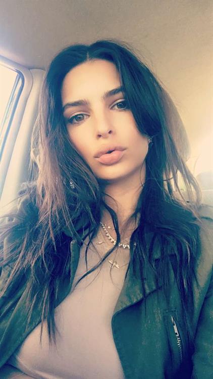 Emily Ratajkowski taking a selfie