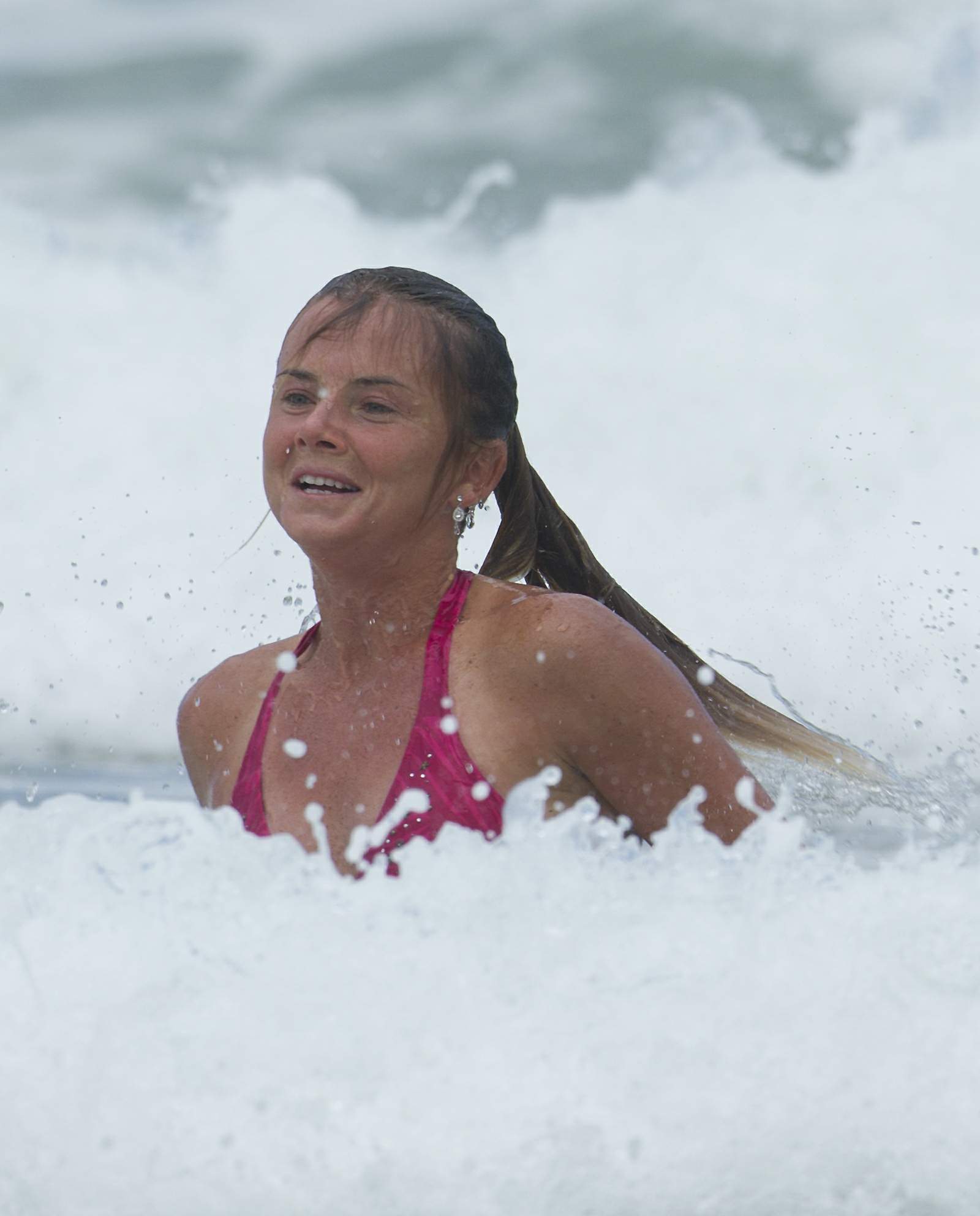 Daniela Hantuchova bikini beach surfing candids in Brisbane, Australia, December 26, 2012 
