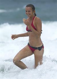 Daniela Hantuchova bikini beach surfing candids in Brisbane, Australia, December 26, 2012 