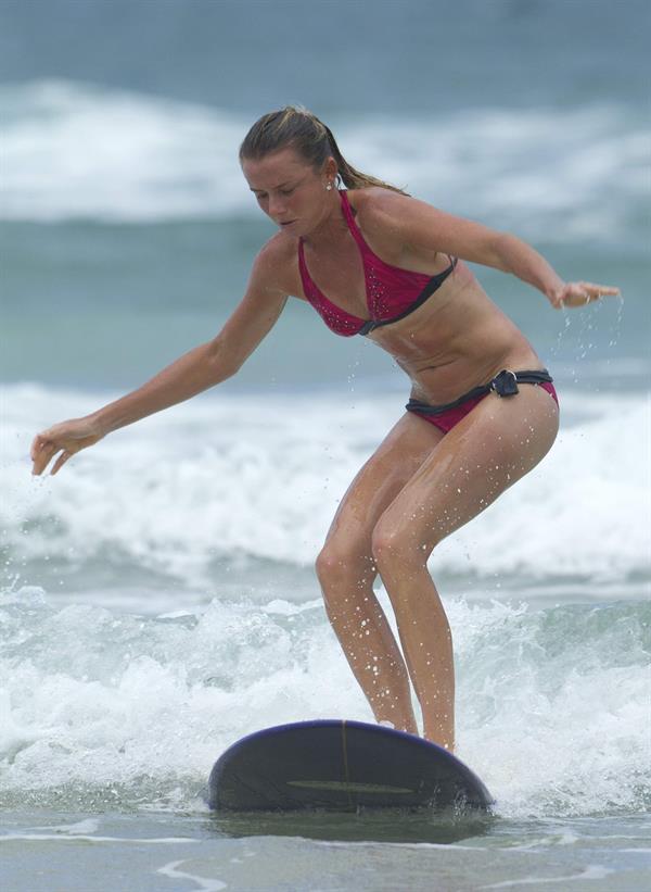 Daniela Hantuchova bikini beach surfing candids in Brisbane, Australia, December 26, 2012 