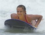 Daniela Hantuchova bikini beach surfing candids in Brisbane, Australia, December 26, 2012 