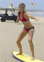 Daniela Hantuchova bikini beach surfing candids in Brisbane, Australia, December 26, 2012 