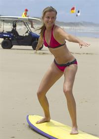 Daniela Hantuchova bikini beach surfing candids in Brisbane, Australia, December 26, 2012 