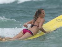 Daniela Hantuchova bikini beach surfing candids in Brisbane, Australia, December 26, 2012 