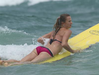 Daniela Hantuchova bikini beach surfing candids in Brisbane, Australia, December 26, 2012 