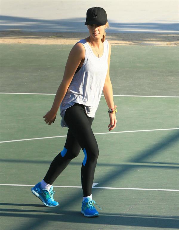 Delta Goodrem playing basketball with a friend in Los Angeles, California on November 3, 2013 