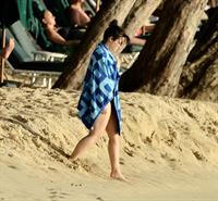 Demi Lovato and her bodyguard are spotted on the beach in Barbados April, 16 2013 