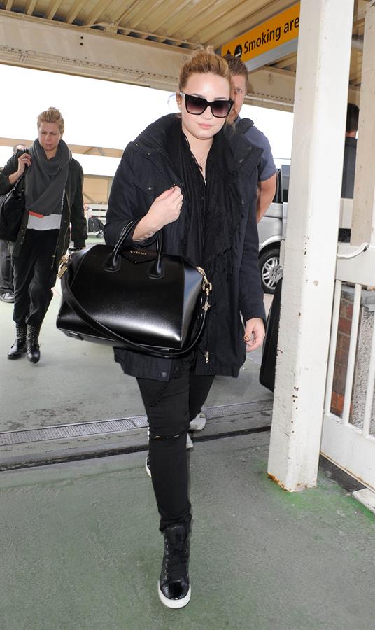 Demi Lovato - Leaves London Heathrow Airport in London (01.06.2013) 