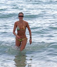 Doutzen Kroes bikini beach pictures in Miami August 16, 2012