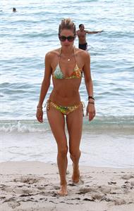 Doutzen Kroes bikini beach pictures in Miami August 16, 2012