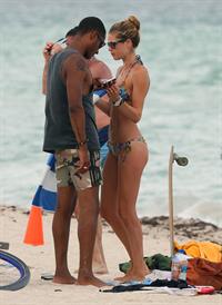 Doutzen Kroes bikini candids on the beach in Miami, Florida Augusts 15, 2012