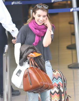 Emma Roberts departing on a flight at LAairport in Los Angeles, California on December 22, 2012 