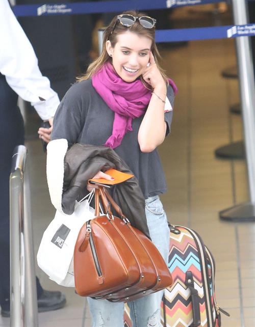 Emma Roberts departing on a flight at LAairport in Los Angeles, California on December 22, 2012 