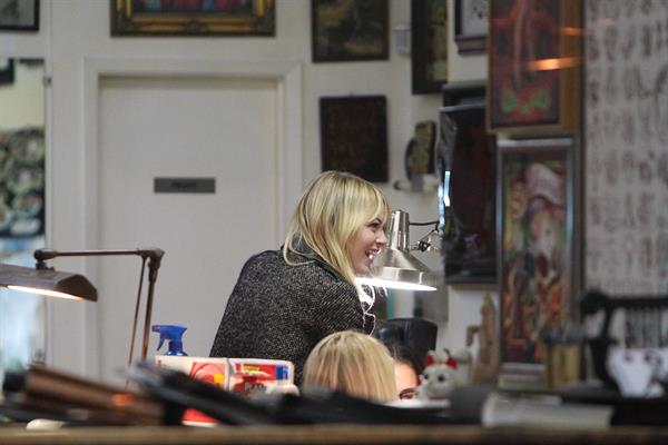 Emma Stone Stopped at Shamrock Tattoo - October 17, 2012 