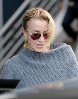 Felicity Huffman Arrives at LAX Airport with daughter in Los Angeles (November 11, 2013) 