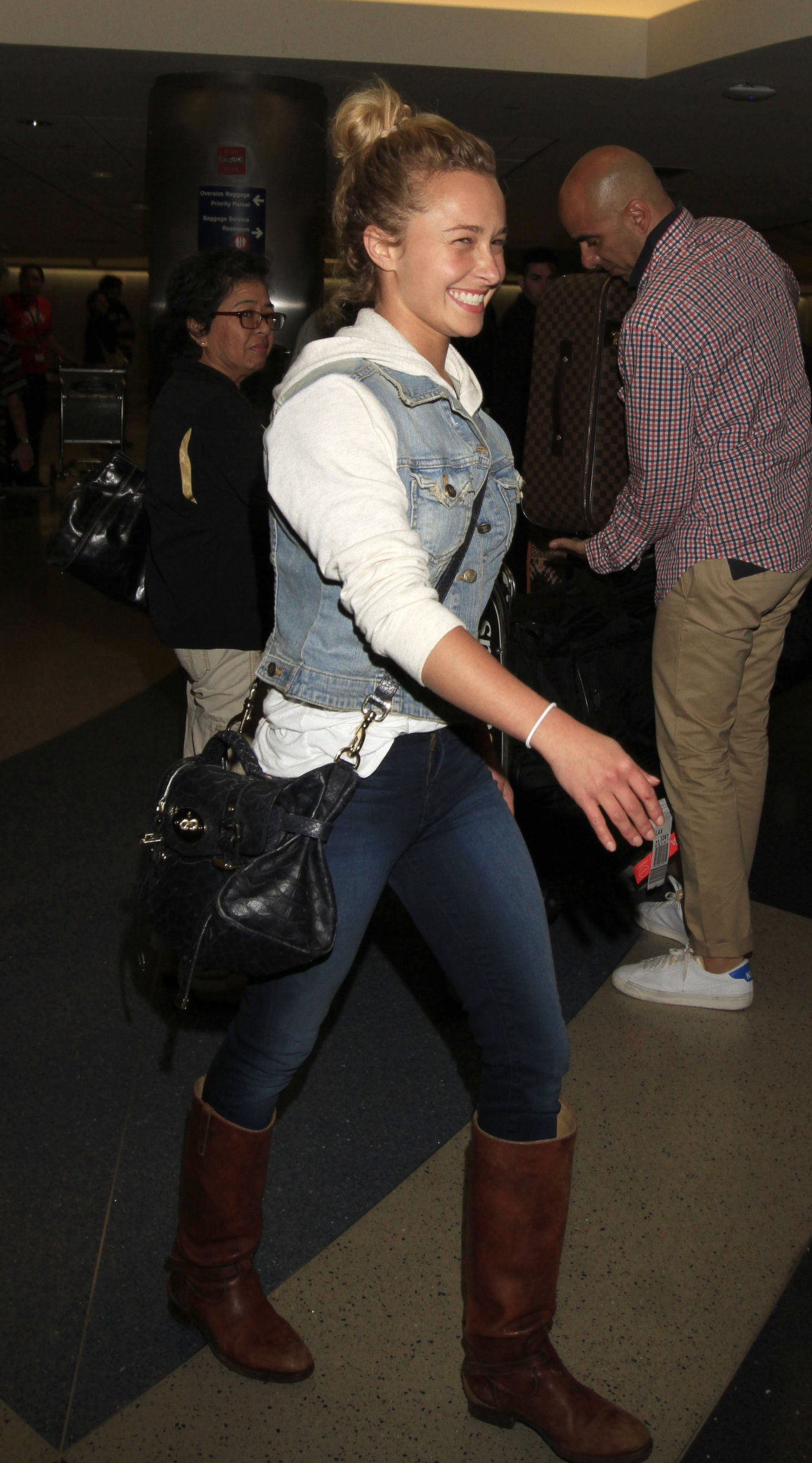Hayden Panettiere arriving at LAX Airport and signing autographs on May 29, 2013