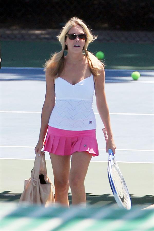 Heather Locklear - Playing with a pink dress Tennis in Malibu (Aug 1, 2012)