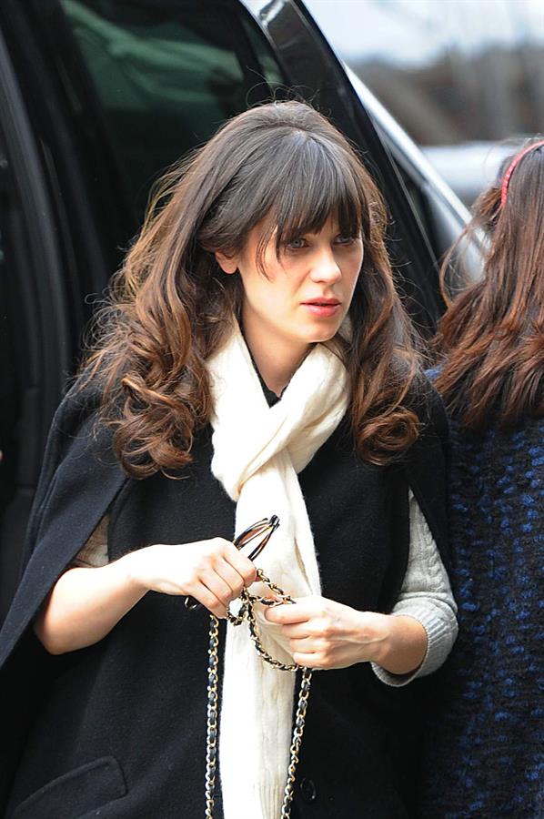 Zooey Deschanel seen out in SoHo holding a Chanel purse. November 16, 2012 