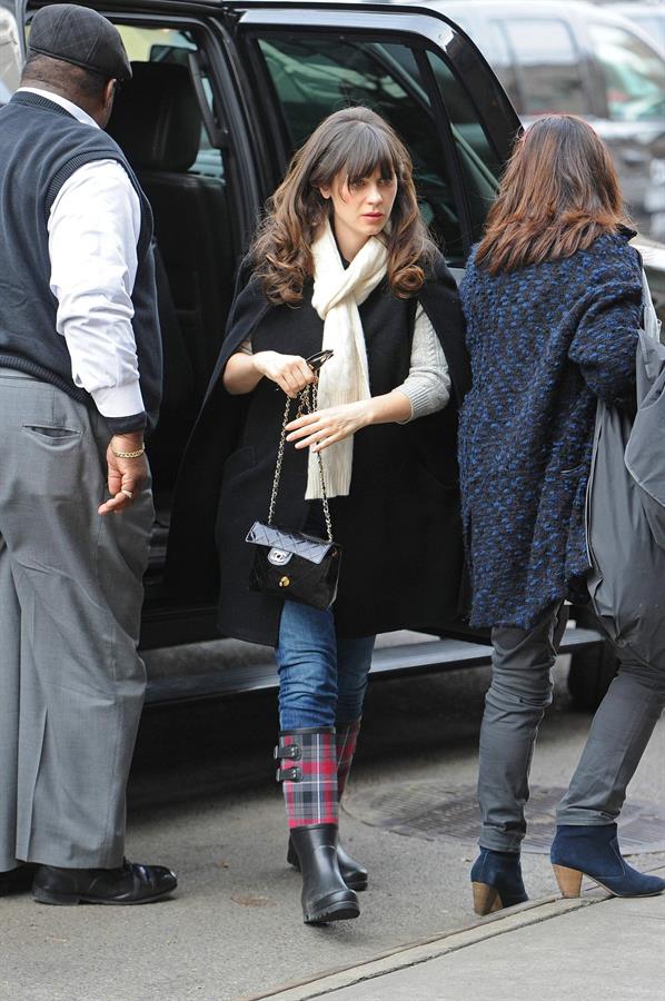 Zooey Deschanel seen out in SoHo holding a Chanel purse. November 16, 2012 