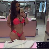 Ines Helene in a bikini taking a selfie