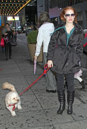 Jessica Chastain with her dog Chaplin arriving to the Walter Kerr Theatre in New York City December 27, 2012 
