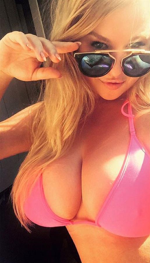 Chloe Michelle in a bikini taking a selfie