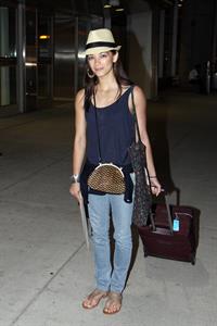 Kristin Kreuk - Pearson International Airport arrival candids in Toronto (July 16, 2012)
