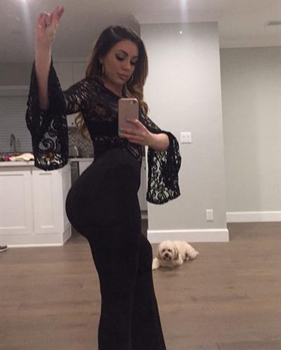 Uldouz Wallace taking a selfie