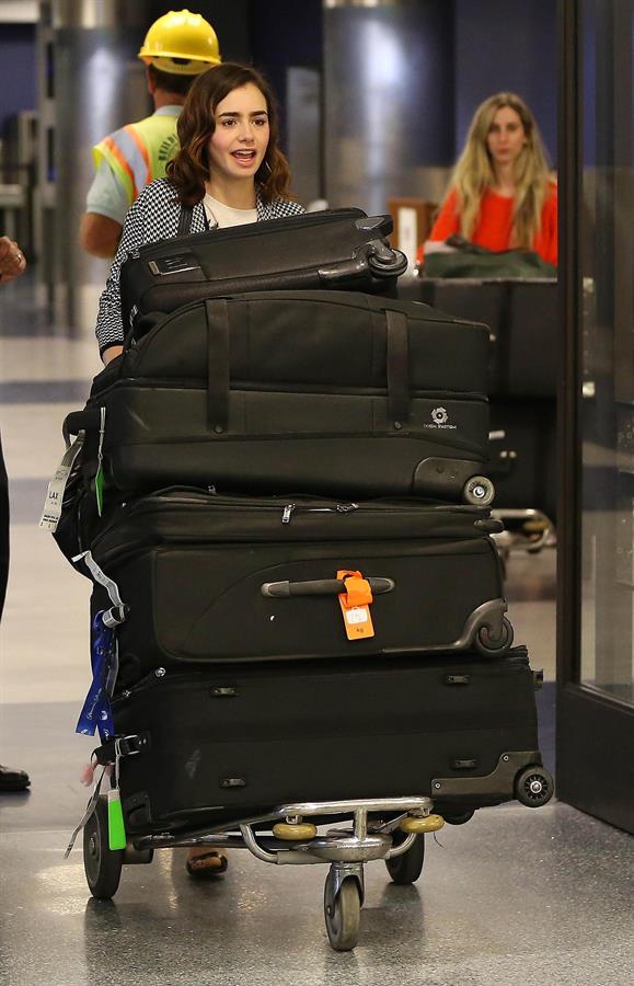 Lily Collins - LAX Airport 8/27/13