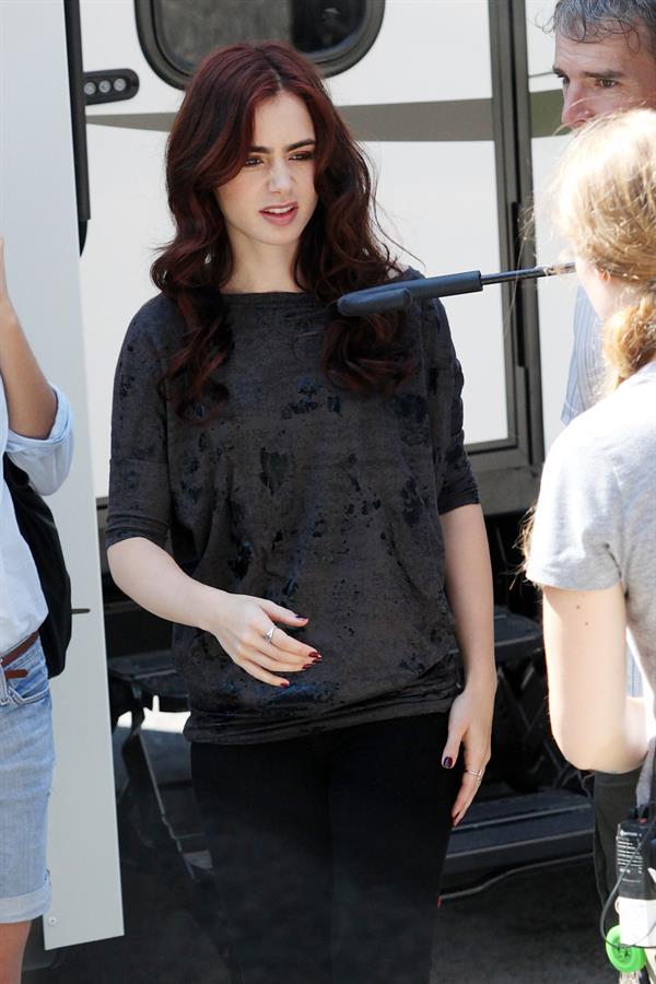 Lily Collins On a break from filming her new movie The Mortal Instruments City of Bones in Toronto