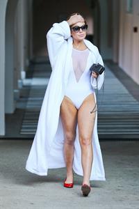 Lindsay Lohan - Wearing a swimsuit at a hotel pool in Hollywood 05.08.12