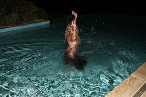 Mariah Carey Looks stunning as she relaxes in the water while on Easter vacation April 2, 2013