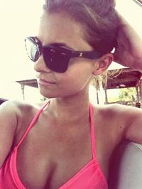 Paris Nichole in a bikini taking a selfie