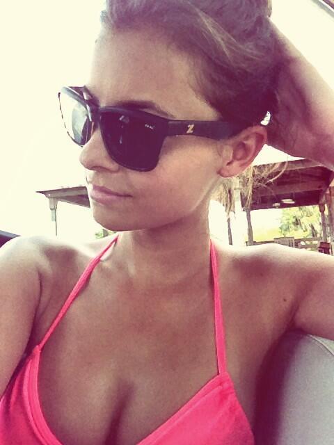 Paris Nichole in a bikini taking a selfie