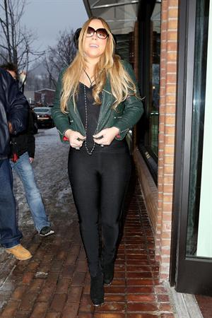 Mariah Carey made another stop at the Louis Vuitton store to shop with a family member. December 24, 2012 
