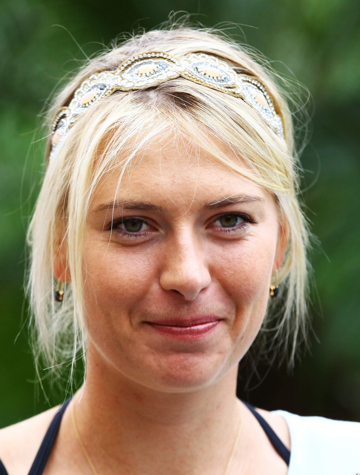 Maria Sharapova Pictures Maria Sharapova poses for a Photograph during a WTA all access Hour at the Ritz Carlton Hotel in Key Biscayne